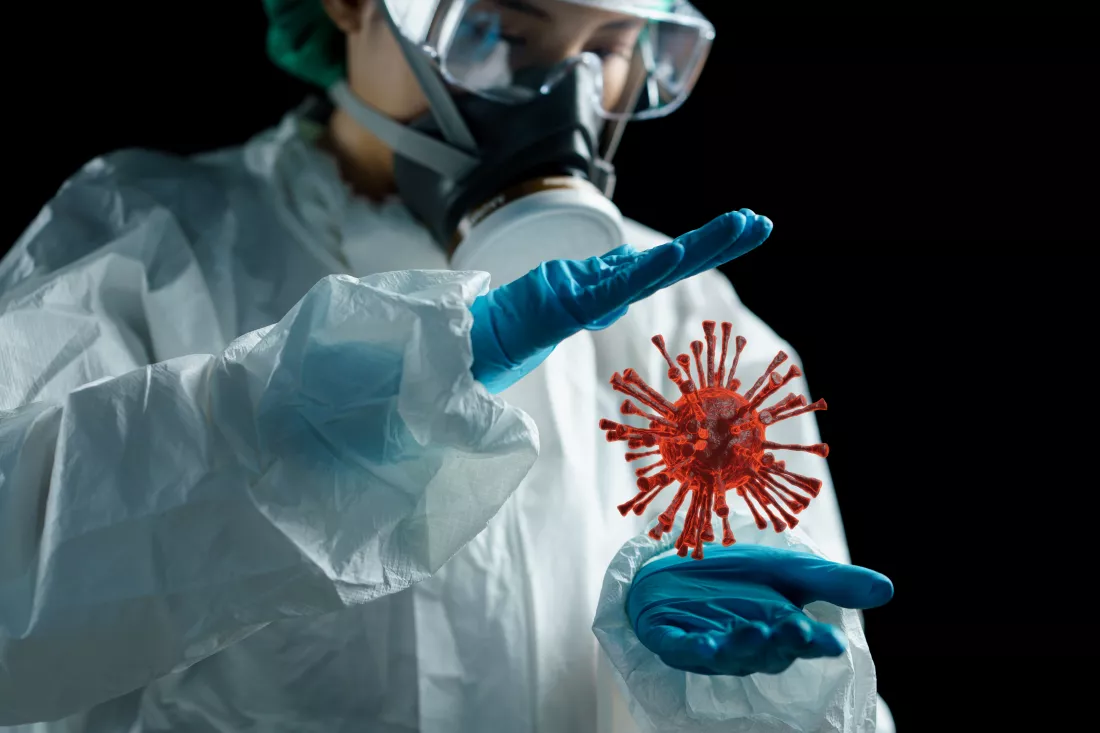 woman-medic-white-hazmat-protective-suit-goggles-respirator-mask-with-pathogen-respiratory-hand